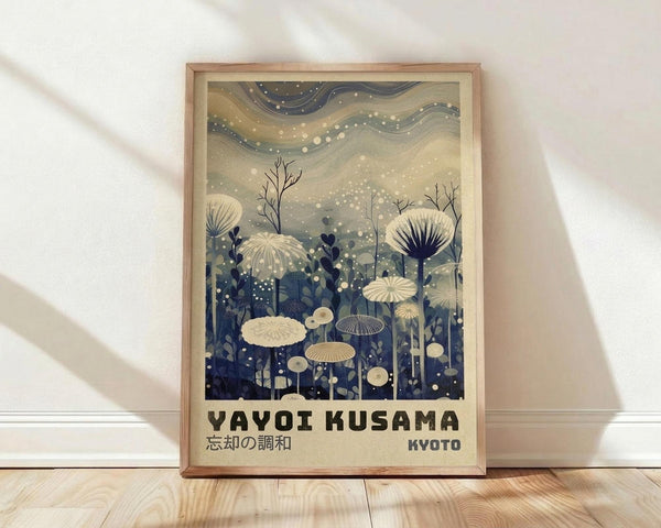 May include: Framed poster print leaning against white wall on wooden floor. Artwork features dreamy botanical scene with cream-colored mushrooms and dandelion seed heads against blue and beige swirling sky dotted with white spots. Japanese text appears at bottom. Natural wood frame with light wood grain visible. Soft natural lighting creates gentle shadows on textured white wall.
