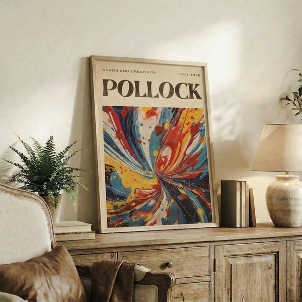 a framed poster of a colorful abstract painting, which is displayed on a wooden cabinet or shelf in a living room setting.