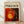The image is a framed poster with a vibrant abstract painting on the cover.
