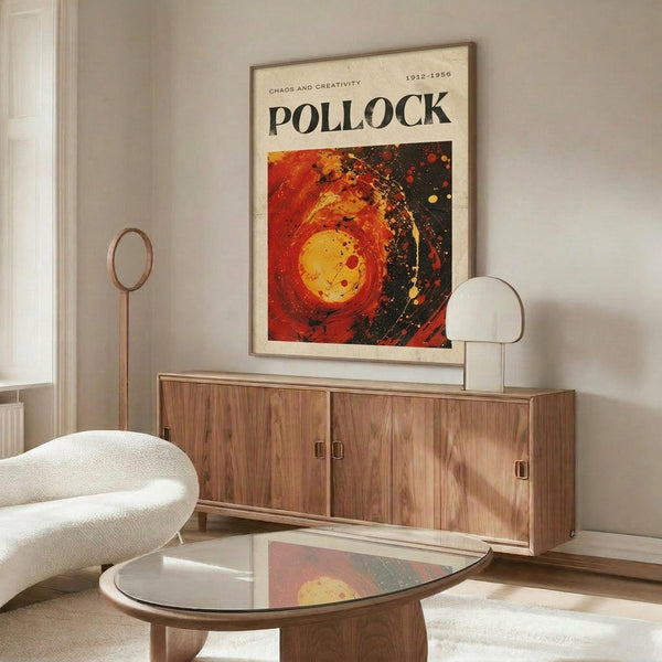 a living room with a large abstract painting hanging on the wall above a wooden cabinet. The painting has a vibrant mix of red, orange, and yellow colors, creating a striking visual contrast. The room also includes a white sofa, a glass coffee table, and a lamp, contributing to the overall modern and stylish aesthetic.