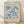 The image is a framed poster featuring the artwork of the famous French artist Henri Matisse. The poster displays a floral pattern in shades of blue and white, and includes text that provides information about the artwork and its location.