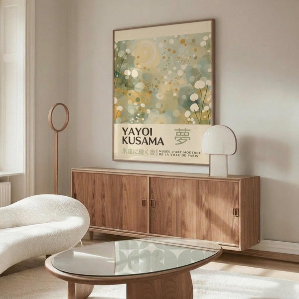 a modern living room with a large abstract painting on the wall, a wooden cabinet, a white sofa, and a glass coffee table.
