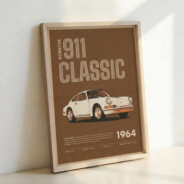 May include: Framed vintage-style poster with brown background featuring white Porsche 911 sports car illustration, cream typography reading "911 CLASSIC" and "1964", displayed in light wood frame leaning against white wall corner with natural lighting casting soft shadows.