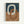 Abstract geometric artwork featuring two interlocking oval rings in cream and terracotta brown against a split background of deep navy blue on top and warm brown below. The minimalist design has organic, hand-drawn shapes with subtle texture throughout. Displayed in a thin light wood frame against a white wall.