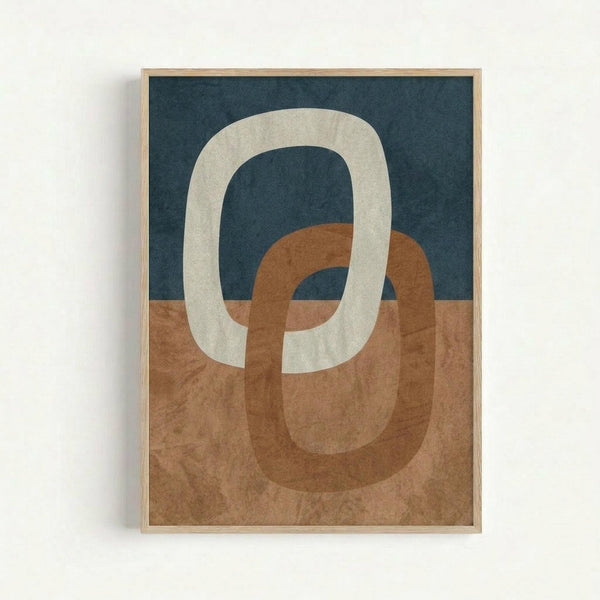 Abstract geometric artwork featuring two interlocking oval rings in cream and terracotta brown against a split background of deep navy blue on top and warm brown below. The minimalist design has organic, hand-drawn shapes with subtle texture throughout. Displayed in a thin light wood frame against a white wall.