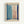 Abstract artwork featuring soft blue and pink rectangular color blocks on a cream background, framed by bold navy blue brushstrokes forming a loose border. The composition has a minimalist, painterly quality with gentle color transitions and organic edges. Displayed in a light wood frame against a white wall, with artist signature visible in the bottom right corner.