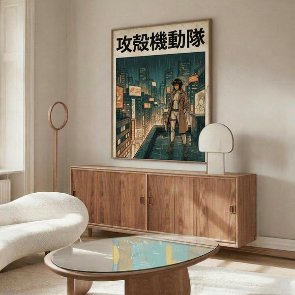 May include: Vintage-style anime poster mounted on white wall above wooden sideboard, featuring character in trench coat walking through neon-lit cyberpunk cityscape with Japanese text header. Modern living room setting with cream upholstered chair, glass-top coffee table, and minimalist white table lamp. Warm wood tones complement teal and orange poster colors.