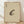 May include: Framed vintage-style Japanese artwork featuring a detailed brown and cream spotted frog illustration on beige textured paper, displayed in light wood frame against white wall on wooden floor with natural lighting and soft shadows