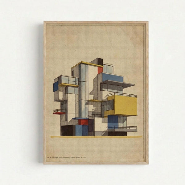 Framed architectural drawing showing a modernist building complex with geometric, stacked cubic forms in various colors including yellow, blue, red, and gray. The structure features multiple levels, balconies, and large windows arranged in an abstract, Bauhaus-inspired composition. The artwork is rendered on aged, grid-lined paper with a beige patina and housed in a simple light wood frame against a white wall.