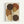 Abstract geometric composition featuring overlapping organic circular shapes in warm earth tones including dark brown, rust orange, golden yellow, and cream colors. A vertical band of small black polka dots on white background runs through the center, intersecting with the painted circles. The artwork has a contemporary minimalist style with visible brushstroke textures on the colored shapes. Displayed in a light wood frame against a white wall.