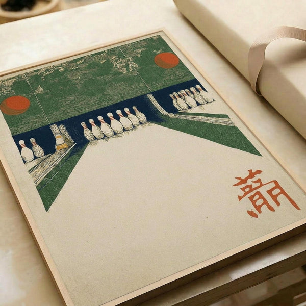 Japanese woodblock print showing a modernist bowling alley scene with white bowling pins arranged on blue lanes, green geometric surfaces, and two orange circular elements in the upper portion. Red Japanese characters appear in the lower right corner. The print is displayed on cream paper with visible texture, positioned on a white surface next to rolled paper in soft lighting.