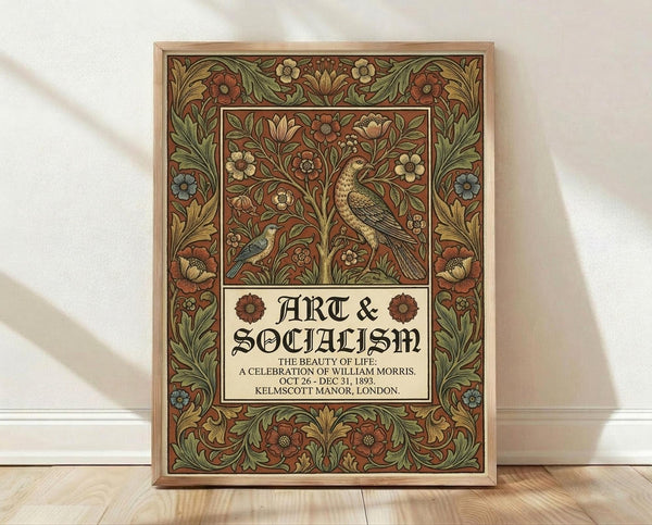 May include: Framed vintage-style poster with ornate William Morris-inspired design featuring birds and botanical motifs in earth tones of rust, green, and gold. The decorative border surrounds central panel with detailed flora, fauna, and "Art & Socialism" text. Natural wood frame displayed against white wall on light wooden floor with soft natural lighting creating gentle shadows.