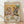 May include: Framed poster print leaning against white wall on light wood floor. Artwork shows whimsical illustration of two anthropomorphic dogs having afternoon tea - a poodle in floral dress with pearl necklace holding teacup, and a bulldog in green vest with bow tie. Table set with tiered serving stand, scones, sandwiches, floral china teapot and cups. Colorful title "DOGS' TEA PARTY" at top. Natural wood frame, vintage storybook illustration style.