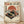 May include: Vintage-style Japanese poster featuring a red turntable with gold record against cream background with large orange sun, cherry blossoms, and Mount Fuji silhouette. Japanese text in red and black characters, retro horizontal lines, technical specifications at bottom. Displayed in light wood frame leaning against white wall on wooden floor.