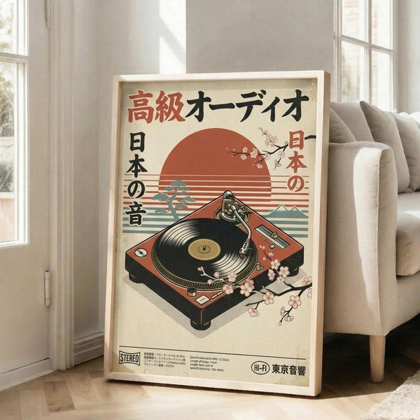 May include: Framed vintage-style Japanese poster featuring orange turntable with vinyl record against cream background, red sun with cherry blossoms, Japanese text in red and black characters, displayed on light wooden floor next to beige upholstered chair in bright room with white walls and large windows