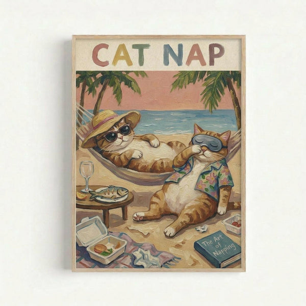 Framed vintage-style poster showing two orange tabby cats relaxing on a tropical beach. One cat wearing a sun hat and sunglasses lounges in a hammock, while another in a floral Hawaiian shirt sits nearby wearing sunglasses. The scene includes palm trees, blue ocean, pink sunset sky, and beach accessories like a wine glass, fish plate, takeout containers, and a book titled "The Art of Napping." Colorful letters spell "CAT NAP" across the top in retro styling.