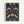 Ornate decorative pattern on dark navy background featuring symmetrical pairs of cream and coral-colored birds with detailed feathers, surrounded by intertwining vines, strawberry motifs, and stylized flowers in orange, green and blue. The vintage Arts and Crafts style design is displayed in a light wooden frame against a white wall.