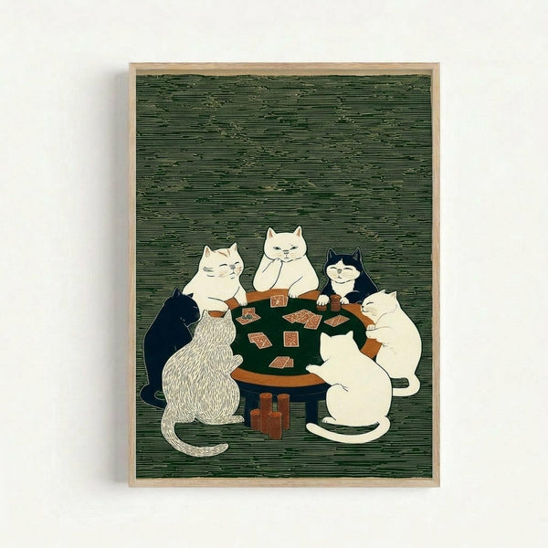 Framed print showing five cats sitting around a green felt poker table playing cards. The artwork features a traditional Japanese woodblock print style with fine line textures against a dark green background. The cats include white, black, striped, and black-and-white varieties, each holding playing cards. Red poker chips are stacked on the wooden table and floor. The print is displayed in a light wood frame against a white wall.