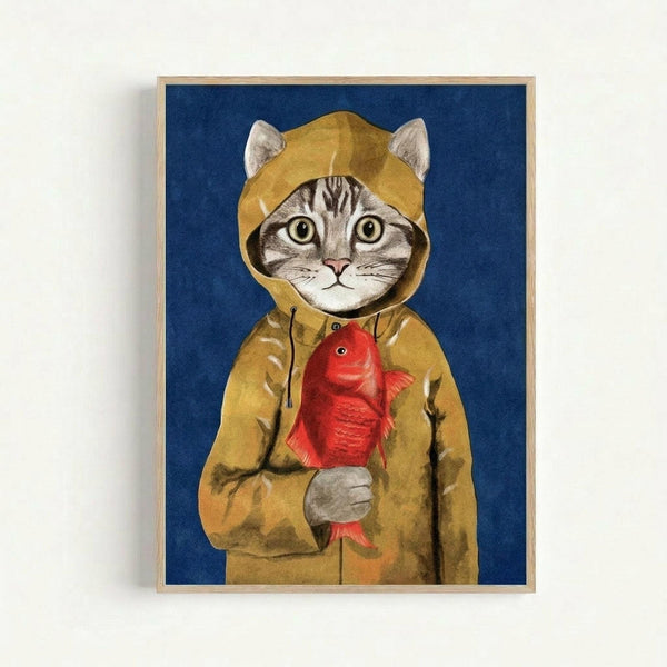 A whimsical illustration of a tabby cat wearing a yellow hooded raincoat, holding a bright red fish. The cat has large green eyes and distinctive striped markings on its face. The artwork is rendered in a painterly style against a deep blue background and displayed in a light wooden frame on a white wall.