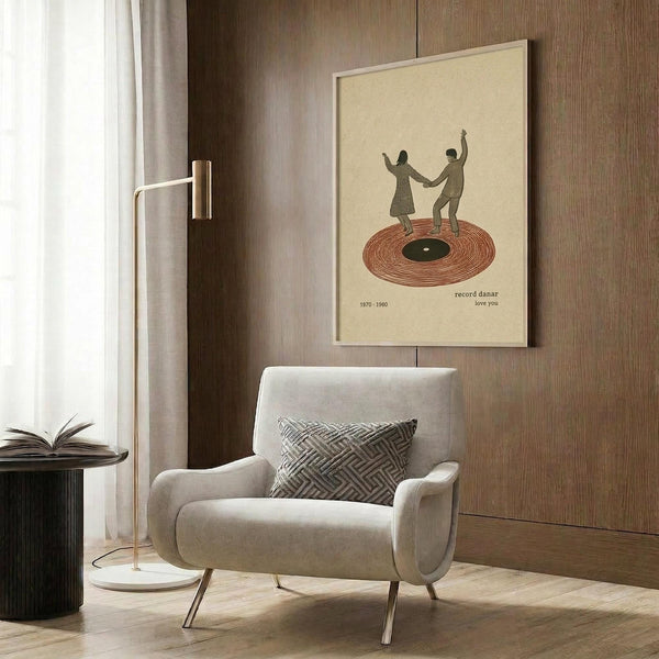 May include: Vintage-style poster artwork displayed in modern living room showing two silhouetted figures dancing on vinyl record, with cream background and rustic orange record design, text reading "record danar love you 1970-1980", hung above beige armchair with geometric pillow, brass floor lamp, and dark wood paneled wall