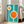 May include: Framed vintage-style poster with turquoise background featuring white circular shapes with bright orange centers resembling abstract eyes or modernist design elements. Black "bauhaus" text runs vertically along right edge. Light wood frame leans against white wall next to beige upholstered sofa in bright, naturally-lit room with hardwood floors.