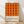 May include: Framed poster with geometric orange and brown circular pattern in Bauhaus style, displayed against white wall on light wooden floor. Design features repeating overlapping circles creating diamond shapes between them. Simple wooden frame with museum text at bottom on cream background.