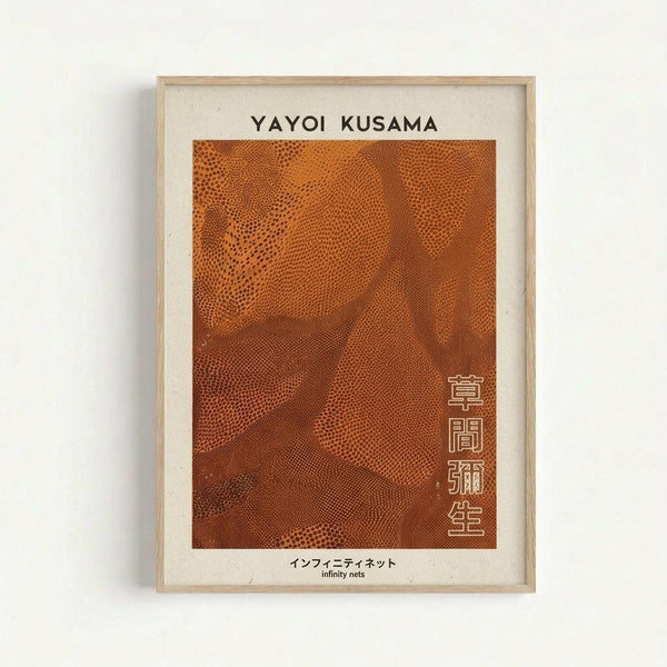Orange poster with dotted pattern creating flowing, wave-like forms in varying densities. Text reads "YAYOI KUSAMA" at top in black letters, with Japanese characters on the right side, and "infinity nets" at bottom. Displayed in light wood frame with cream matting against white wall.