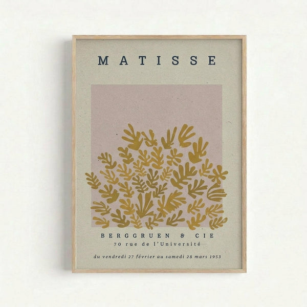 May include: Framed vintage exhibition poster with MATISSE in black letters at top, featuring golden yellow botanical cutout design on dusty pink background with cream matting. Gallery information and 1953 date printed below artwork. Light wood frame displayed against white wall.
