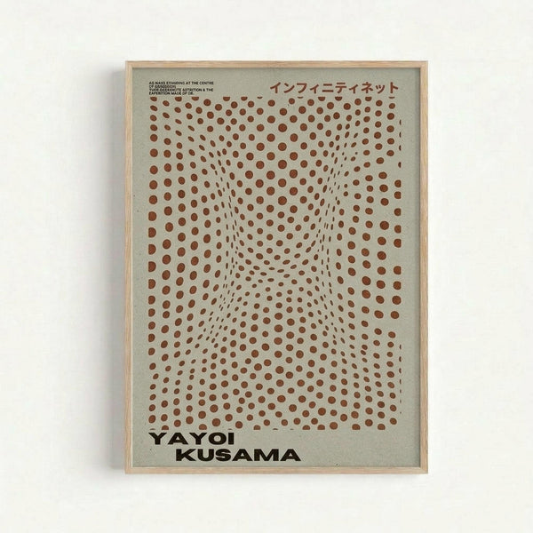 Framed art print featuring a grid of reddish-brown polka dots creating an optical illusion tunnel effect on cream background. Japanese text at top, "YAYOI KUSAMA" printed at bottom in black letters. Light wood frame mounted on white wall. The dots appear to curve inward toward the center, creating dimensional depth and movement.