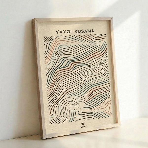 May include: Framed art print featuring flowing wave-like lines in earthy tones of coral, sage green, and black on cream background. Abstract organic curves create rhythmic pattern reminiscent of topographical maps or flowing water. Japanese characters appear at bottom. Natural wood frame leans against white wall, showing realistic home display setting with soft natural lighting.