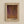 May include: Framed vintage-style art print hanging on cream wall featuring abstract organic forms in warm brown, orange and purple tones with dotted texture patterns. Text reads "Tokyo 1998" and "YAYOI KUSAMA" in black letters. Light wood frame with beige matting creates museum poster aesthetic.