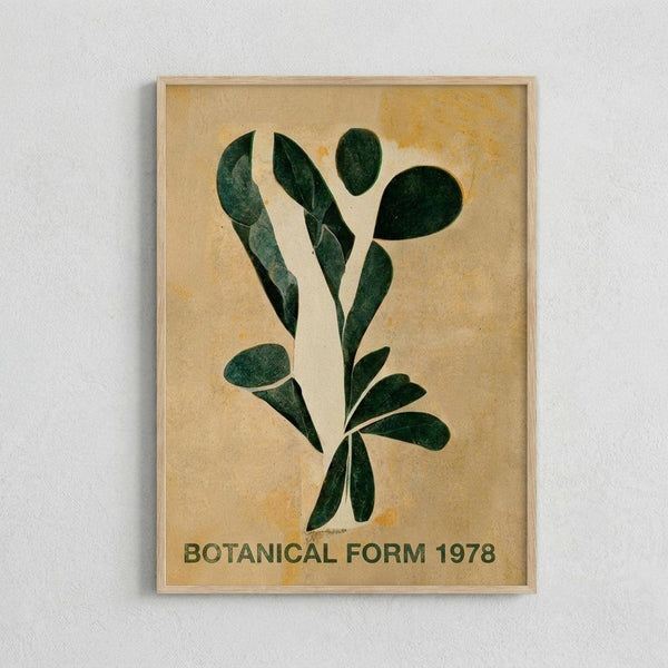 May include: Framed botanical art print hanging on white wall featuring dark green leaves arranged in artistic composition on aged cream background with yellow undertones, displayed in light wood frame