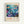 Framed vintage-style exhibition poster featuring a vibrant underwater scene with colorful tropical fish, coral, and sea plants in blues, purples, pinks and oranges. The poster includes Japanese text and "MUSÉE D'ART MODERNE DE LA VILLE DE PARIS" at bottom, with dates "5. JUIN - 19. JUIN 1986" at top. Displayed in light wood frame against white wall background.