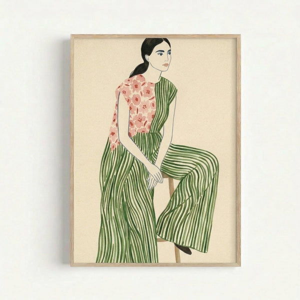 Woman with dark hair in ponytail sitting on wooden stool, wearing pink floral top and green striped wide-leg pants. Minimalist illustration style with cream background, displayed in light wood frame against white wall. The artwork features soft colors and clean lines in a contemporary portrait format.