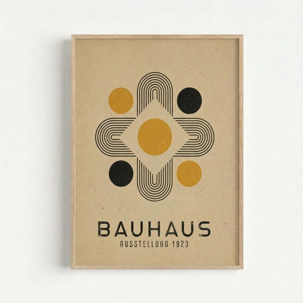 Minimalist geometric poster featuring a central cross-like design made of black concentric lines with five circles - one yellow circle at center, four circles at cardinal points alternating between mustard yellow and dark green. Text reads "BAUHAUS" and "AUSSTELLUNG 1923" below the design. Beige textured background in light wood frame mounted on white wall.