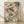 May include: Framed vintage-style illustration of two speckled fish with coral-pink fins swimming among green aquatic plants and floating bubbles, displayed in light wood frame against white wall on wooden floor with soft natural lighting and fabric shadows