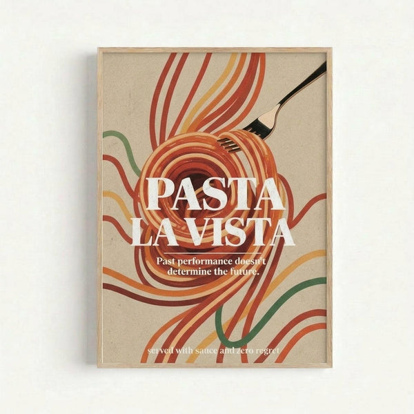 May include: Framed poster print on wall showing retro-style pasta illustration with colorful curved noodle shapes in red, orange, yellow, and green against cream background. Features fork twirling spaghetti with bold white text reading "PASTA LA VISTA" and smaller tagline below. Light wood frame, clean wall background.