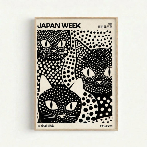 Framed vintage-style poster featuring stylized black cats with white polka dot patterns against a cream background. The cats have distinctive white oval eyes and whiskers, created in a mid-century modern graphic design style. Text reads "JAPAN WEEK" at top with "1984" and Japanese characters, "TOKYO" at bottom. The poster is displayed in a light wood frame against a white wall.