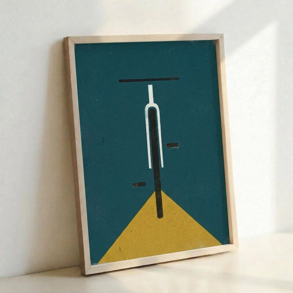 May include: Framed minimalist bicycle poster with teal background and yellow triangular base, showing white and black geometric bicycle handlebars and stem in simple line art style, displayed in light wood frame leaning against white wall