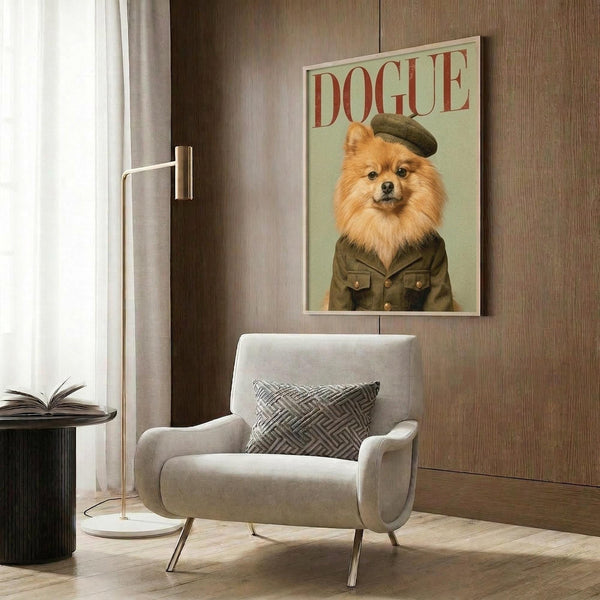 May include: Framed poster featuring a Pomeranian dog wearing olive green military-style jacket and beret against pale background with red "DOGUE" text at top, displayed on wood paneled wall above modern gray upholstered armchair with geometric patterned pillow, alongside gold floor lamp and dark side table with open book