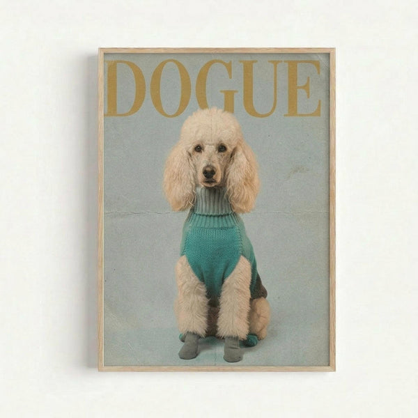 Framed poster featuring a cream-colored poodle wearing a teal knit turtleneck sweater and matching socks, sitting against a pale blue background. Golden text at top reads "DOGUE" in large serif letters, mimicking a fashion magazine cover. The wooden frame has a natural finish and the poster has a vintage, editorial photography aesthetic.