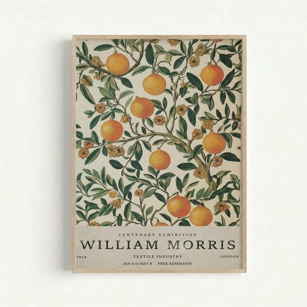 Vintage botanical poster featuring orange citrus fruits and green foliage in William Morris's decorative style, with exhibition text at bottom reading "Centenary Exhibition William Morris 1934 Textile Industry London Jan 6 to May 6 Free Admission" on cream background in light wood frame against white wall