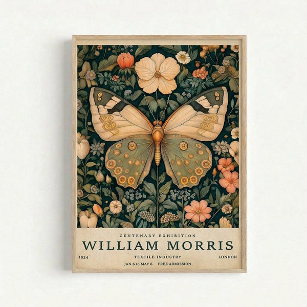 Vintage-style botanical poster featuring a large butterfly with cream and olive green wings decorated with circular patterns, surrounded by flowers and foliage in coral, cream, and green tones against a dark teal background. The artwork includes exhibition text at the bottom mentioning a centenary exhibition, textile industry, and London venue details. Displayed in a light wooden frame against a white wall.