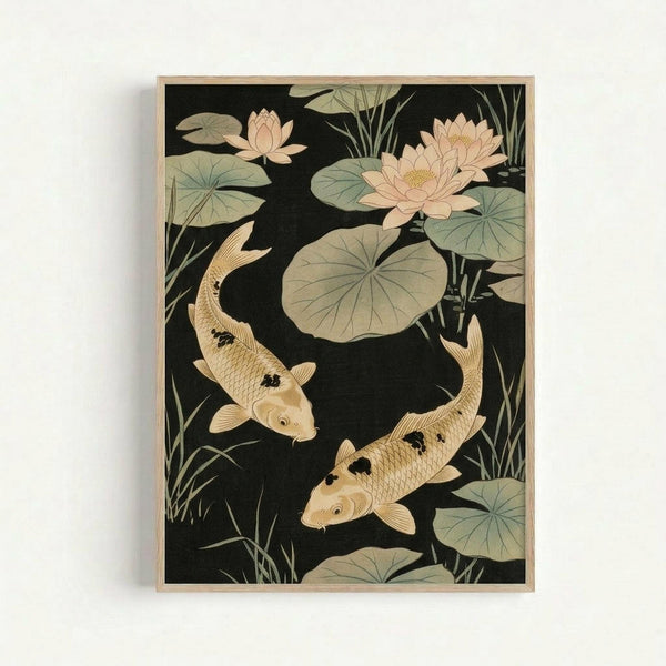 Framed artwork showing two golden koi fish swimming among lotus flowers and lily pads on a dark background. The Japanese-style illustration features pale pink lotus blooms, large circular lily pad leaves in muted green tones, and tall aquatic grasses. The fish have detailed scales and flowing fins rendered in warm cream and gold colors with dark accent markings. Set in a light wooden frame against a white wall.