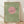 May include: Framed minimalist art print with sage green textured background featuring a large pink circle resembling a sun or moon with black silhouettes of birds flying across and around it. The artwork is displayed in a thin natural wood frame, leaning against a white wall on light wooden flooring with soft natural lighting creating shadows.