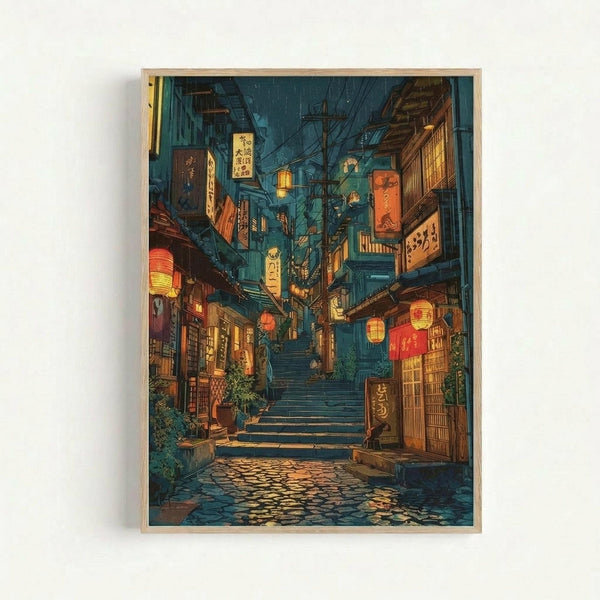 A framed poster showing a narrow Japanese alley at night with warm lanterns glowing in red, orange and yellow against deep blue evening light. Traditional wooden buildings with signs in Japanese characters line both sides of stone steps leading upward. The wet cobblestone street reflects the lantern light, creating a cozy, atmospheric scene. The artwork is displayed in a simple light wood frame against a white wall, showcasing the detailed illustration's rich colors and nostalgic mood.