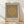 May include: Framed Bauhaus-style poster with black vertical stripes and tan circle on beige textured background, displayed in light wood frame against white wall on wooden floor with soft natural lighting and fabric shadows