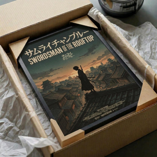 May include: Framed poster print in cardboard shipping box with protective tissue paper wrapping. The artwork shows a silhouetted samurai figure standing on traditional Japanese rooftops against an orange sunset sky. The print has Japanese text at the top and displays muted green, orange, and brown tones. The frame appears black and the poster is carefully packaged for shipping.