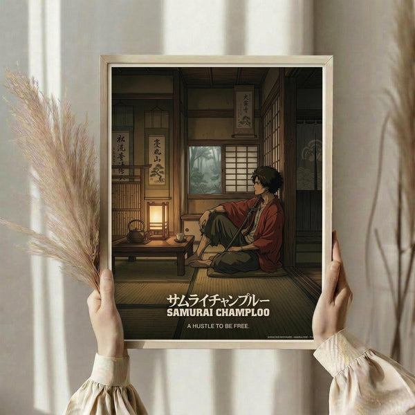 May include: Person holding a framed anime-style poster showing a samurai character in red robes sitting in a traditional Japanese room with tatami mats, wooden architecture, and scrolls with Japanese text. The poster features the title "Samurai Champloo" and tagline "A Hustle to be Free" in white text. Warm lighting creates cozy atmosphere with dried pampas grass visible to the left.