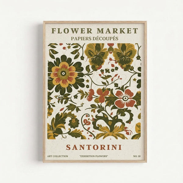 A framed vintage-style botanical poster featuring decorative folk art flowers in olive green, golden yellow, and rust red tones. The design shows stylized blooms, leaves, and flourishing vines in a symmetrical pattern against a cream background. Text reads "FLOWER MARKET" and "PAPIERS DÉCOUPÉS" at the top, "SANTORINI" in the middle, and "ART COLLECTION EXHIBITION FLOWERS NO. 18" at the bottom. The artwork is displayed in a thin natural wood frame against a white wall.